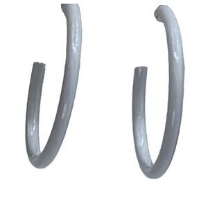 Vintage L.H. Segal white enamel clip earrings